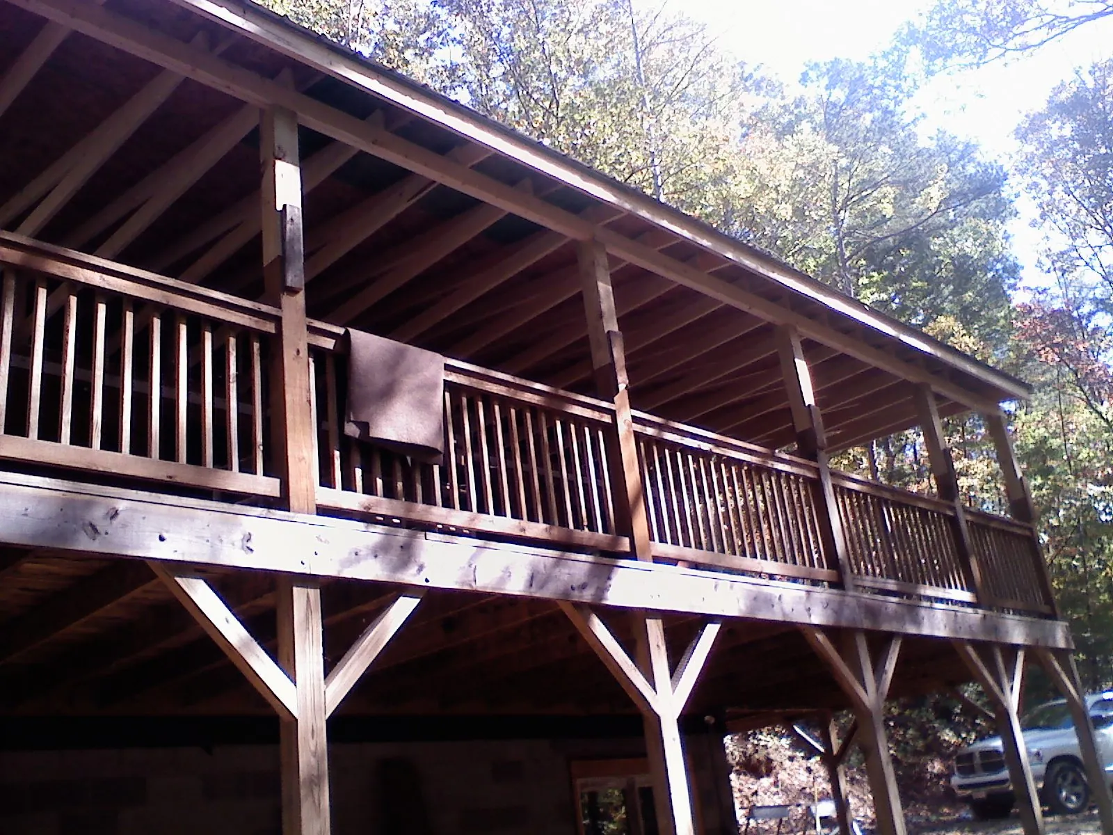 Timber framing under a new elevated porch and deck — Roof Leak Repair in Parkersburg by Roofing Brothers